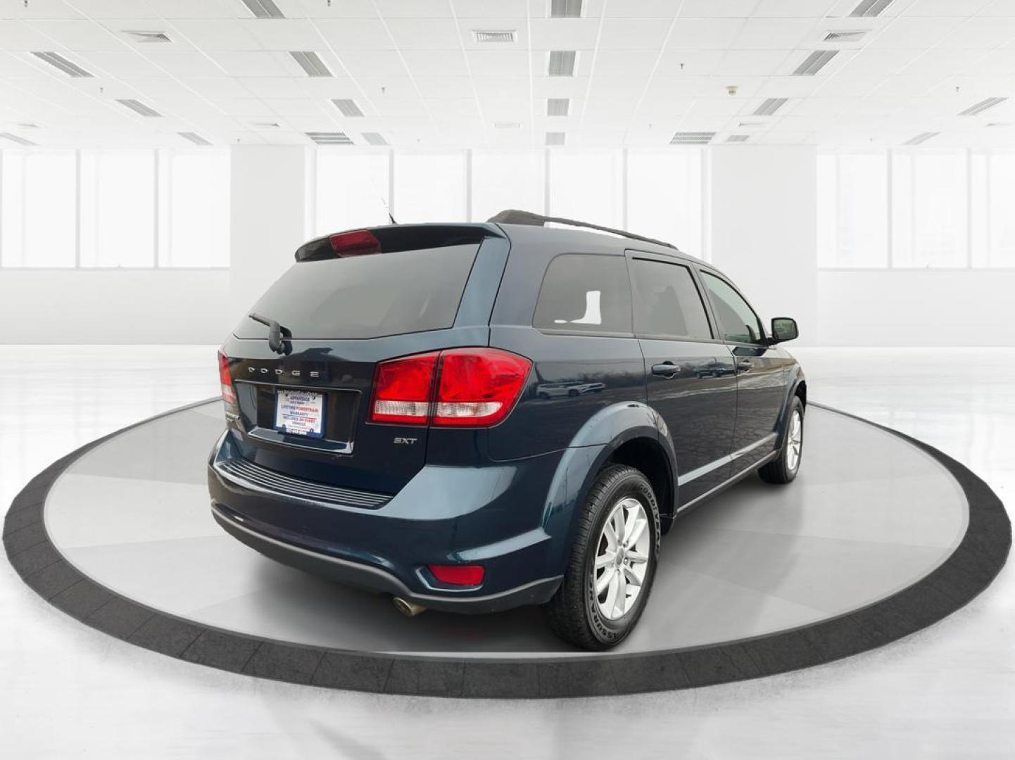 2014 Dodge Journey SXT AWD (3C4PDDBGXET) with an Other engine, located at 8750 N County Rd 25A, Piqua, OH, 45356, (937) 908-9800, 40.164391, -84.232513 - Photo#2