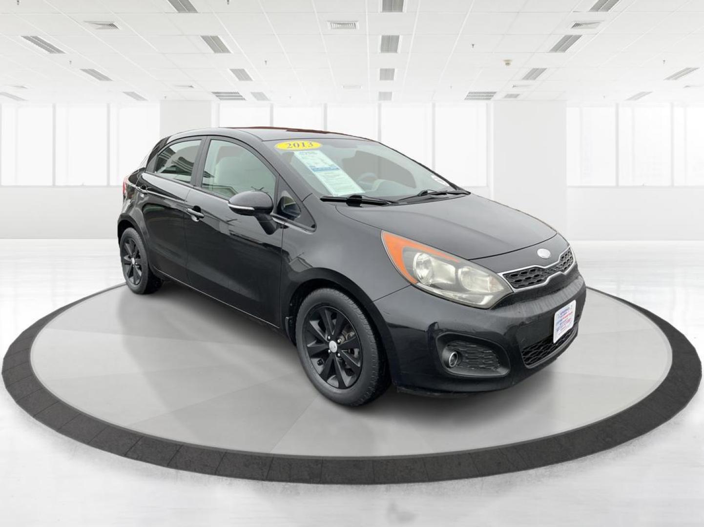 2013 Kia Rio EX (KNADN5A30D6) with an 1.6L I-4 gasoline direct injection engine, located at 880 E. National Road, Vandalia, OH, 45377, (937) 908-9800, 39.891918, -84.183594 - 2013 Kia Rio EX - Photo#0