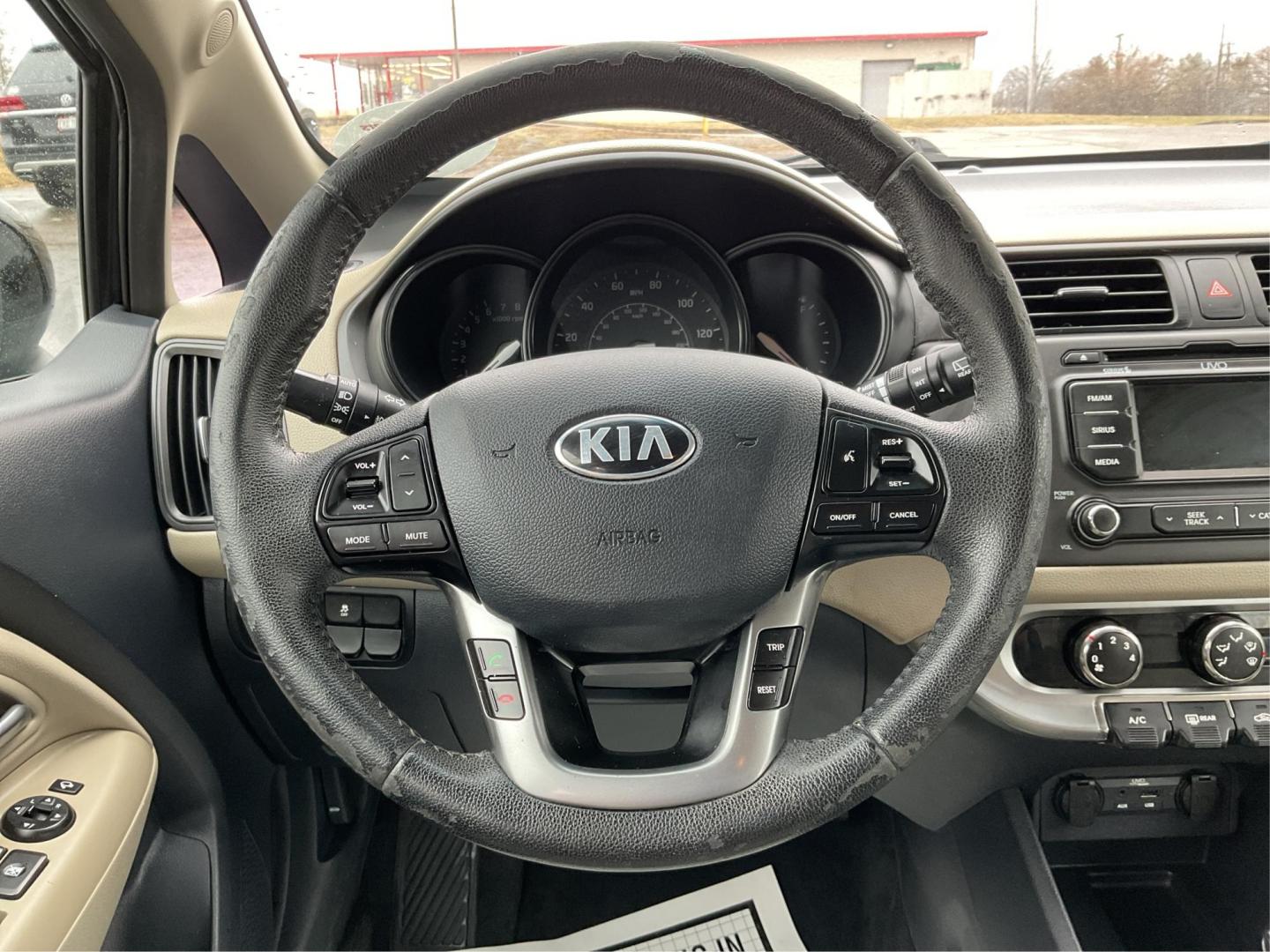 2013 Kia Rio EX (KNADN5A30D6) with an 1.6L I-4 gasoline direct injection engine, located at 880 E. National Road, Vandalia, OH, 45377, (937) 908-9800, 39.891918, -84.183594 - 2013 Kia Rio EX - Photo#15