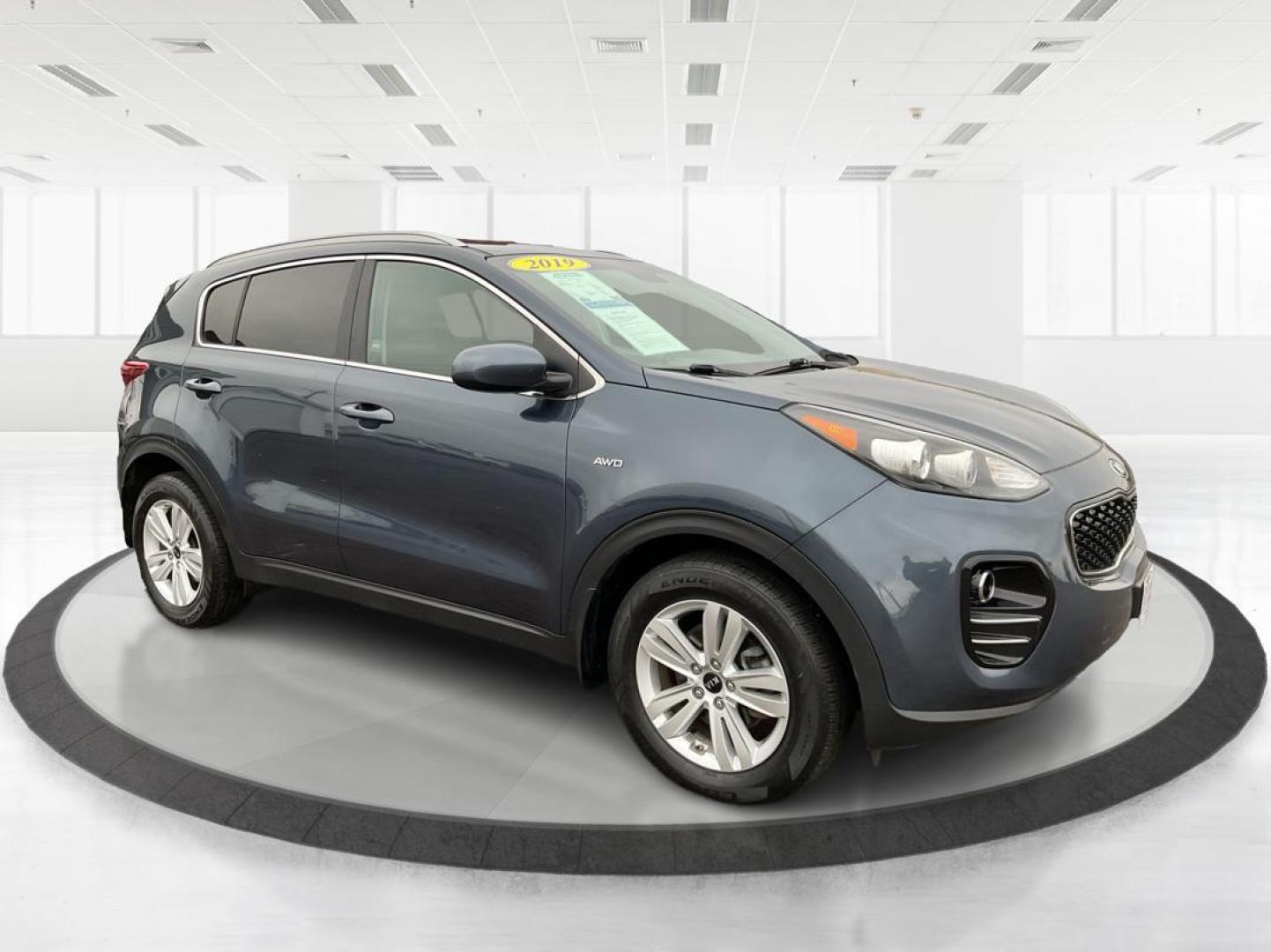 2019 Kia Sportage LX (KNDPMCAC2K7) with an Theta II 2.4L I-4 gasoline direct injection engine, located at 880 E. National Road, Vandalia, OH, 45377, (937) 908-9800, 39.891918, -84.183594 - Photo#0