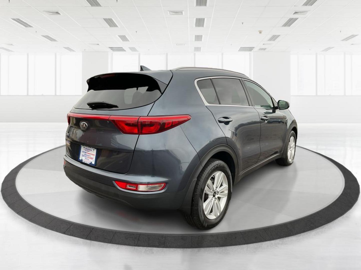 2019 Kia Sportage LX (KNDPMCAC2K7) with an Theta II 2.4L I-4 gasoline direct injection engine, located at 880 E. National Road, Vandalia, OH, 45377, (937) 908-9800, 39.891918, -84.183594 - Photo#2
