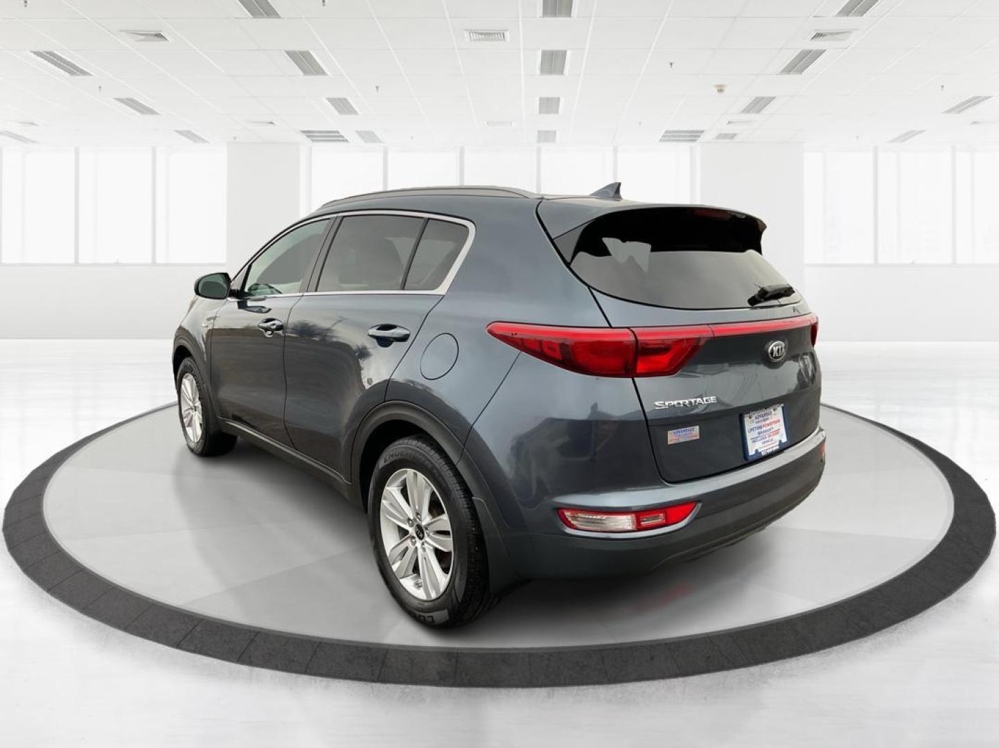 2019 Kia Sportage LX (KNDPMCAC2K7) with an Theta II 2.4L I-4 gasoline direct injection engine, located at 880 E. National Road, Vandalia, OH, 45377, (937) 908-9800, 39.891918, -84.183594 - Photo#4