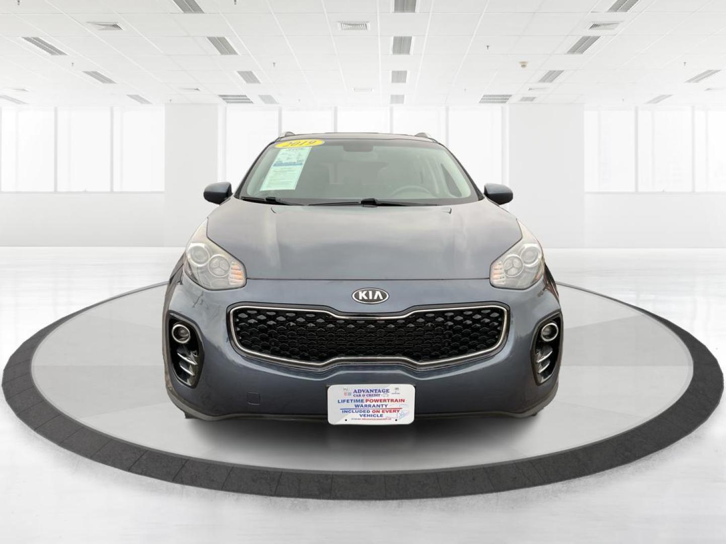 2019 Kia Sportage LX (KNDPMCAC2K7) with an Theta II 2.4L I-4 gasoline direct injection engine, located at 880 E. National Road, Vandalia, OH, 45377, (937) 908-9800, 39.891918, -84.183594 - Photo#6