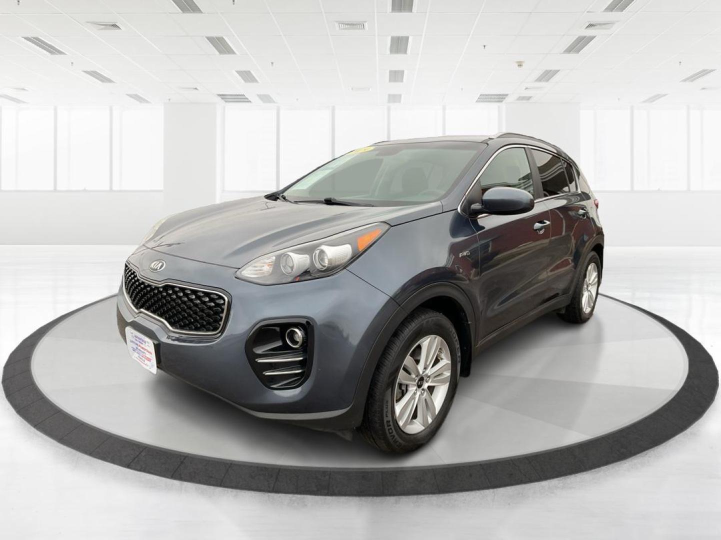 2019 Kia Sportage LX (KNDPMCAC2K7) with an Theta II 2.4L I-4 gasoline direct injection engine, located at 880 E. National Road, Vandalia, OH, 45377, (937) 908-9800, 39.891918, -84.183594 - Photo#7
