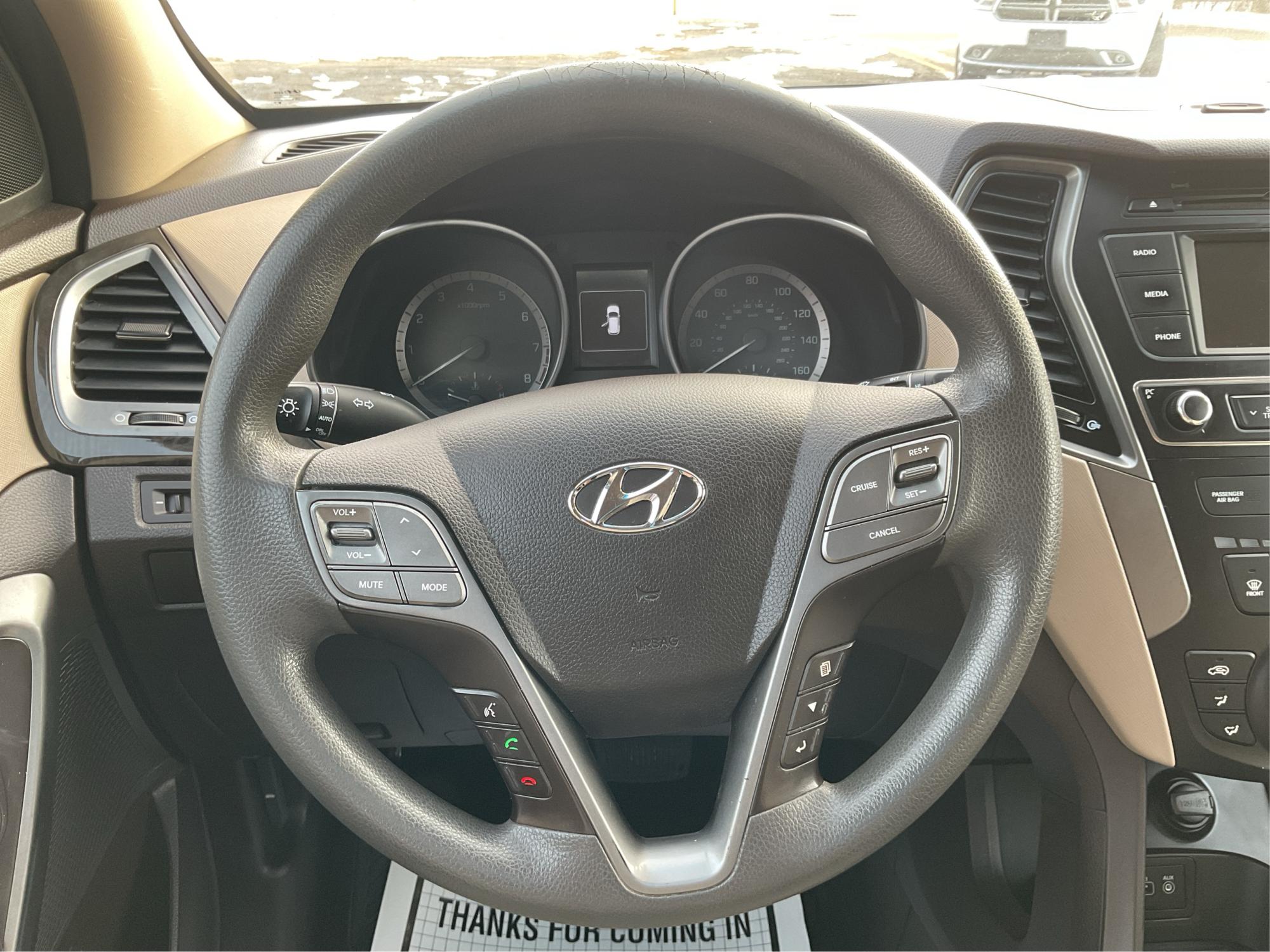 2017 Hyundai Santa Fe Sport 2.4L (5XYZT3LBXHG) with an Theta II 2.4L I-4 gasoline direct injection engine, located at 1099 N County Rd 25A , Troy, OH, 45373, (937) 908-9800, 40.057079, -84.212883 - Photo#15