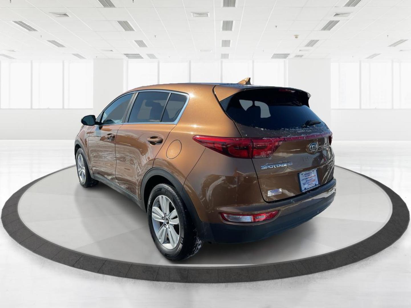 2018 Kia Sportage LX (KNDPM3AC5J7) with an Theta II 2.4L I-4 gasoline direct injection engine, located at 1184 Kauffman Ave, Fairborn, OH, 45324, (937) 908-9800, 39.807072, -84.030914 - Photo#4