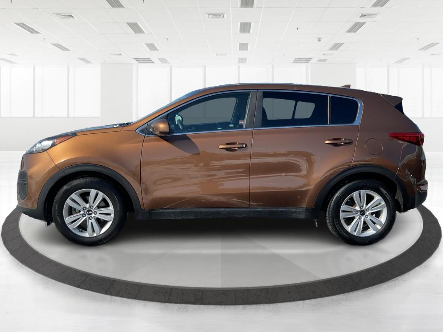 2018 Kia Sportage LX (KNDPM3AC5J7) with an Theta II 2.4L I-4 gasoline direct injection engine, located at 1184 Kauffman Ave, Fairborn, OH, 45324, (937) 908-9800, 39.807072, -84.030914 - Photo#5