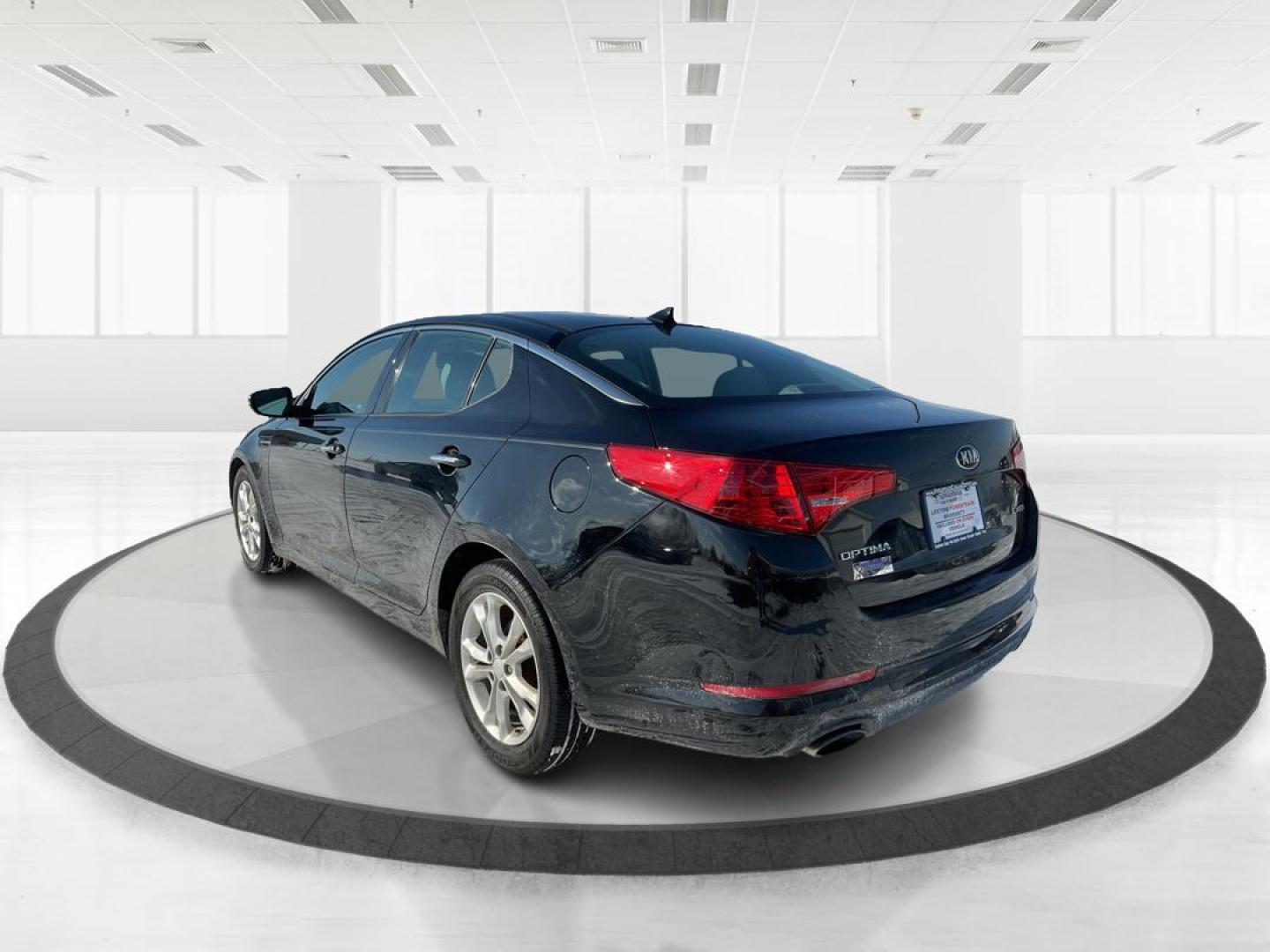 2013 Kia Optima EX (5XXGN4A70DG) with an 2.4L I-4 gasoline direct injection engine, located at 8750 N County Rd 25A, Piqua, OH, 45356, (937) 908-9800, 40.164391, -84.232513 - Photo#4