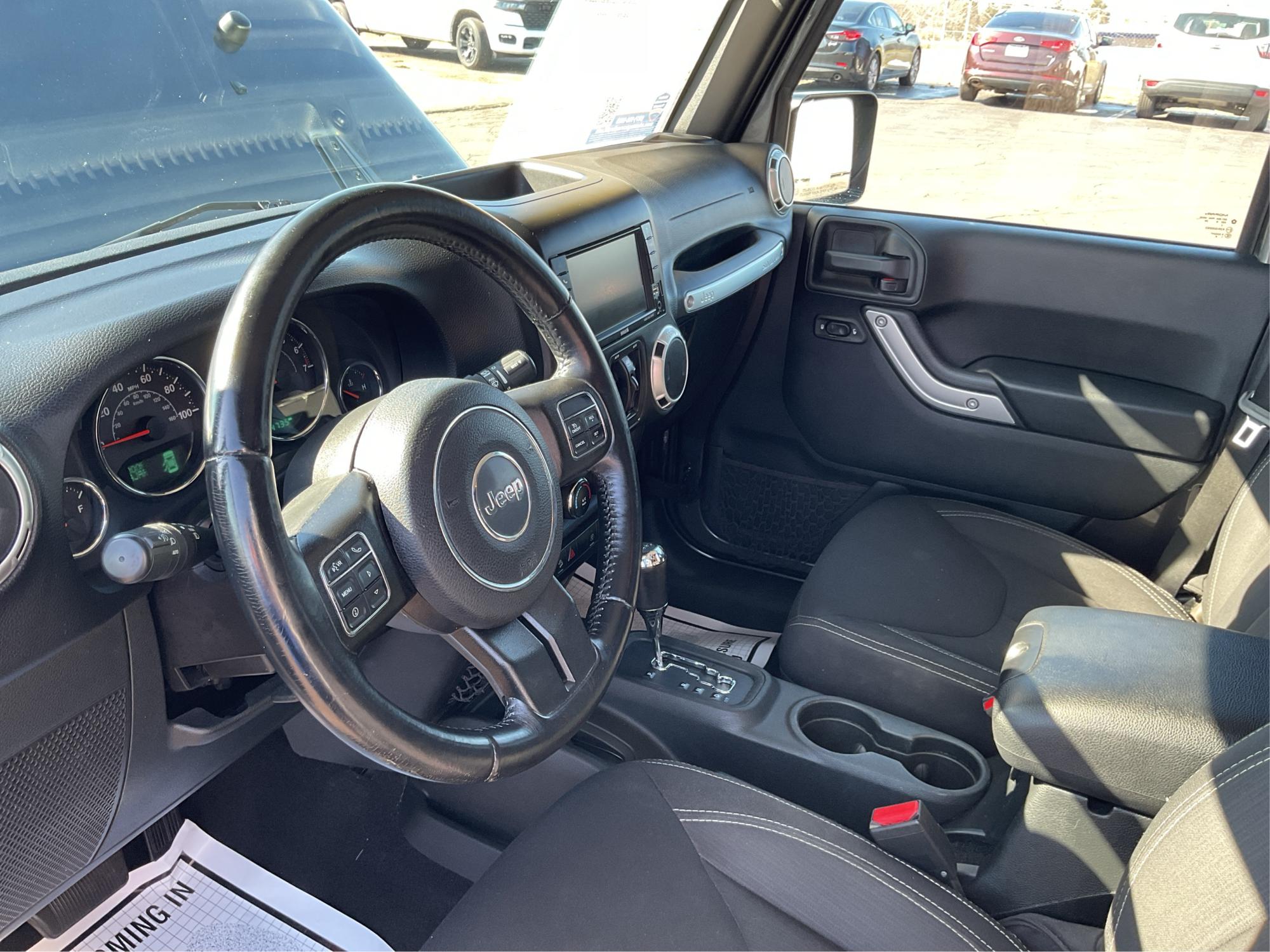 2016 Jeep Wrangler Unlimited Sahara 4WD (1C4BJWEG2GL) with an 3.6L V6 DOHC 24V FFV engine, located at 8750 N County Rd 25A, Piqua, OH, 45356, (937) 908-9800, 40.164391, -84.232513 - 2016 Jeep Wrangler Unlimited Sahara 4WD - Photo#7