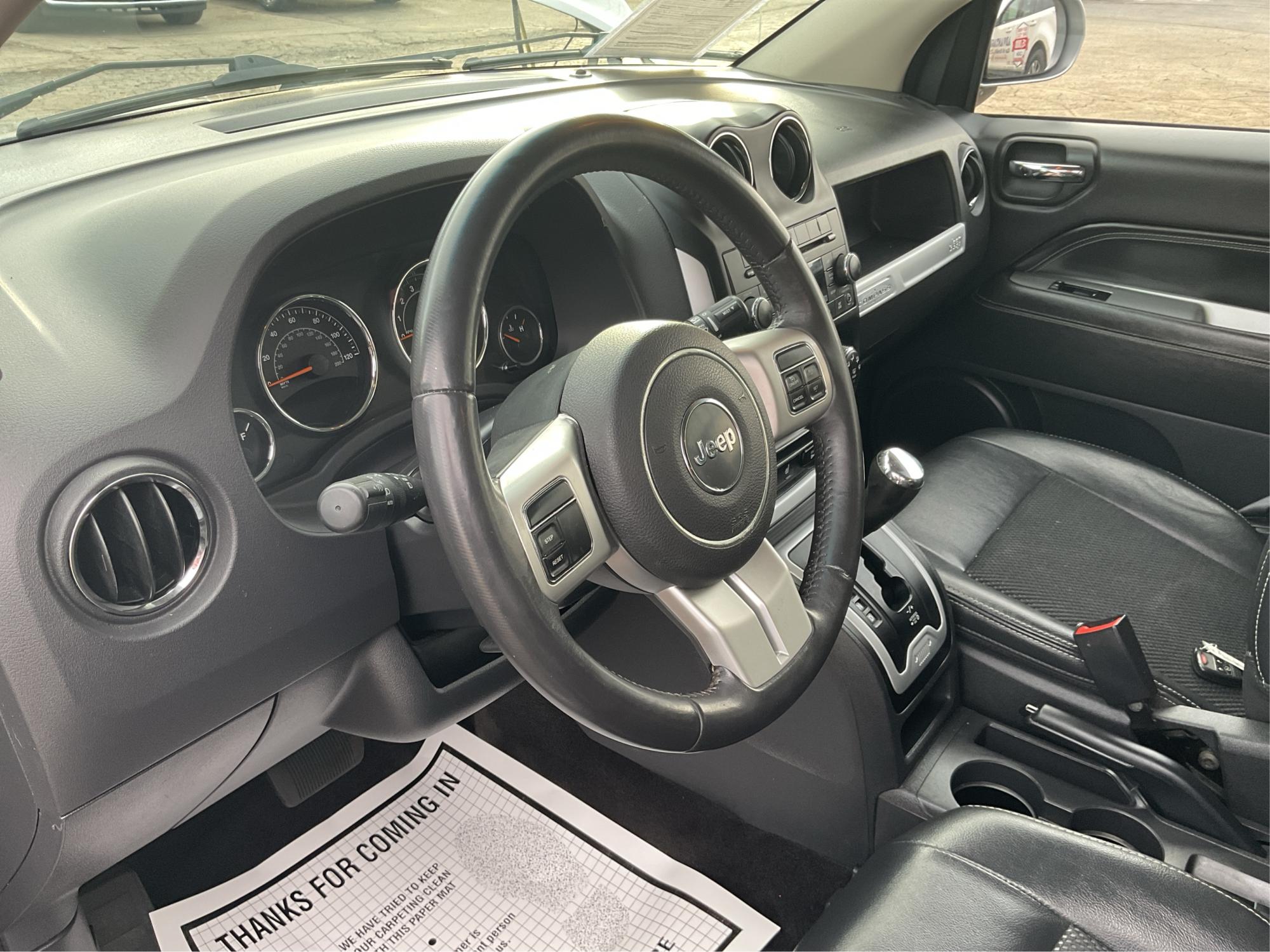 2017 Jeep Compass Latitude 4x4 (1C4NJDEB9HD) with an 2.4L I-4 DOHC engine, located at 1230 East Main St, Xenia, OH, 45385, (937) 908-9800, 39.688026, -83.910172 - 2017 Jeep Compass Latitude 4x4 - Photo#8