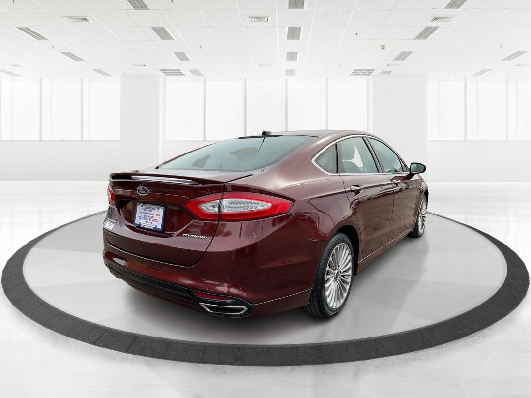 2016 Ford Fusion Titanium (3FA6P0K92GR) with an EcoBoost 2L I-4 gasoline direct injection engine, located at 4508 South Dixie Dr, Moraine, OH, 45439, (937) 908-9800, 39.689976, -84.218452 - Photo#2