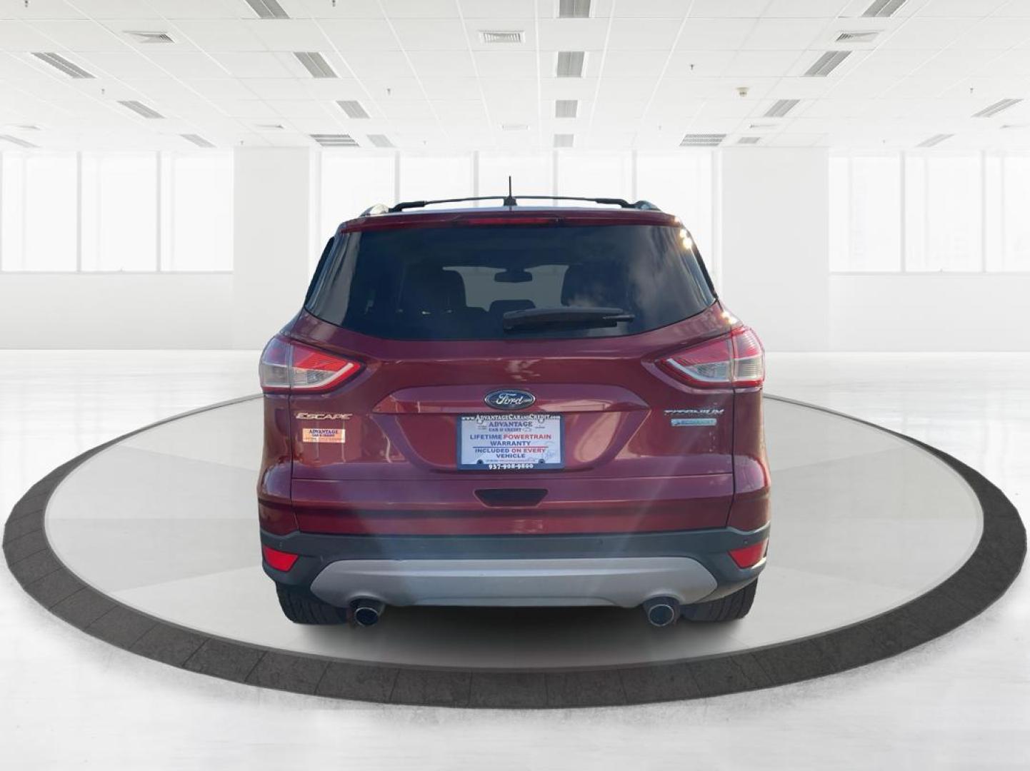 2013 Ford Escape Titanium (1FMCU0J94DU) with an EcoBoost 2L I-4 gasoline direct injection engine, located at 1184 Kauffman Ave, Fairborn, OH, 45324, (937) 908-9800, 39.807072, -84.030914 - Photo#2