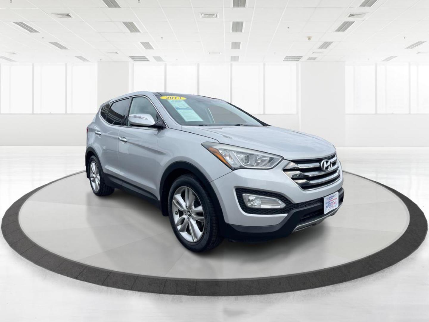 2013 Hyundai Santa Fe Sport 2.0T (5XYZW3LA3DG) with an Theta II 2L I-4 gasoline direct injection engine, located at 401 Woodman Dr, Riverside, OH, 45431, (937) 908-9800, 39.760899, -84.123421 - Photo#0