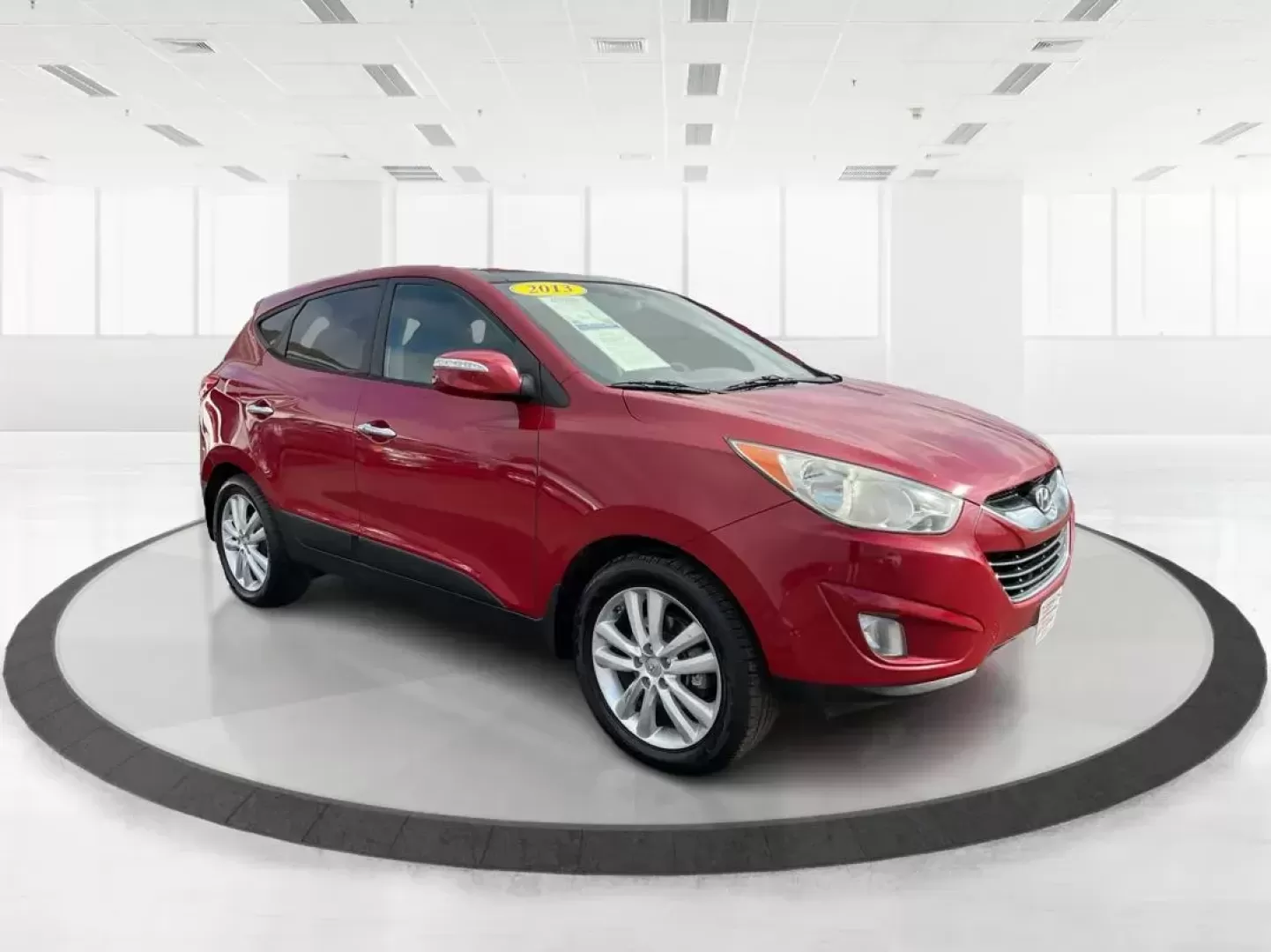 2013 Hyundai Tucson Limited (KM8JU3AC4DU) with an Theta II 2.4L I-4 DOHC engine, located at 1099 N County Rd 25A, Troy, OH, 45373, (937) 908-9800, 40.057079, -84.212883 - Photo#0
