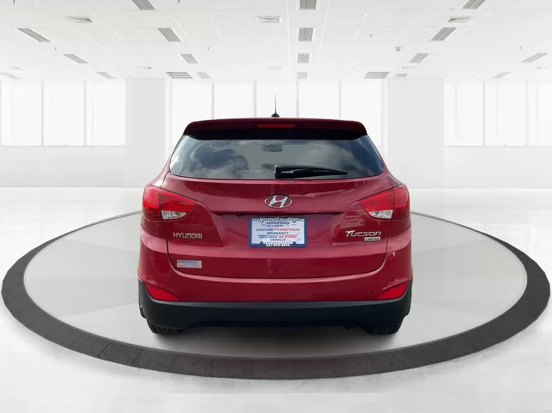 2013 Hyundai Tucson Limited (KM8JU3AC4DU) with an Theta II 2.4L I-4 DOHC engine, located at 1099 N County Rd 25A , Troy, OH, 45373, (937) 908-9800, 40.057079, -84.212883 - 2013 Hyundai Tucson Limited - Photo#2