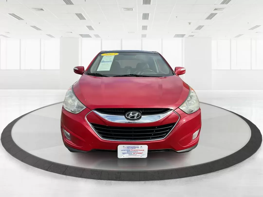 2013 Hyundai Tucson Limited (KM8JU3AC4DU) with an Theta II 2.4L I-4 DOHC engine, located at 1099 N County Rd 25A , Troy, OH, 45373, (937) 908-9800, 40.057079, -84.212883 - 2013 Hyundai Tucson Limited - Photo#6