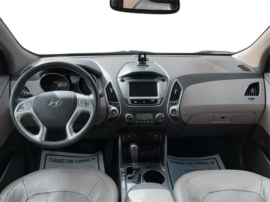 2013 Hyundai Tucson Limited (KM8JU3AC4DU) with an Theta II 2.4L I-4 DOHC engine, located at 1099 N County Rd 25A , Troy, OH, 45373, (937) 908-9800, 40.057079, -84.212883 - 2013 Hyundai Tucson Limited - Photo#19