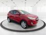 2013 Hyundai Tucson Limited (KM8JU3AC4DU) with an Theta II 2.4L I-4 DOHC engine, located at 1099 N County Rd 25A, Troy, OH, 45373, (937) 908-9800, 40.057079, -84.212883 - Photo#0