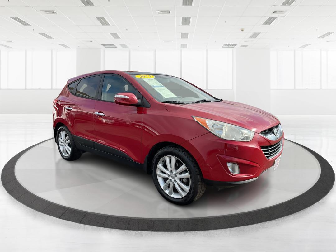 2013 Hyundai Tucson Limited (KM8JU3AC4DU) with an Theta II 2.4L I-4 DOHC engine, located at 1184 Kauffman Ave, Fairborn, OH, 45324, (937) 908-9800, 39.807072, -84.030914 - Photo#0