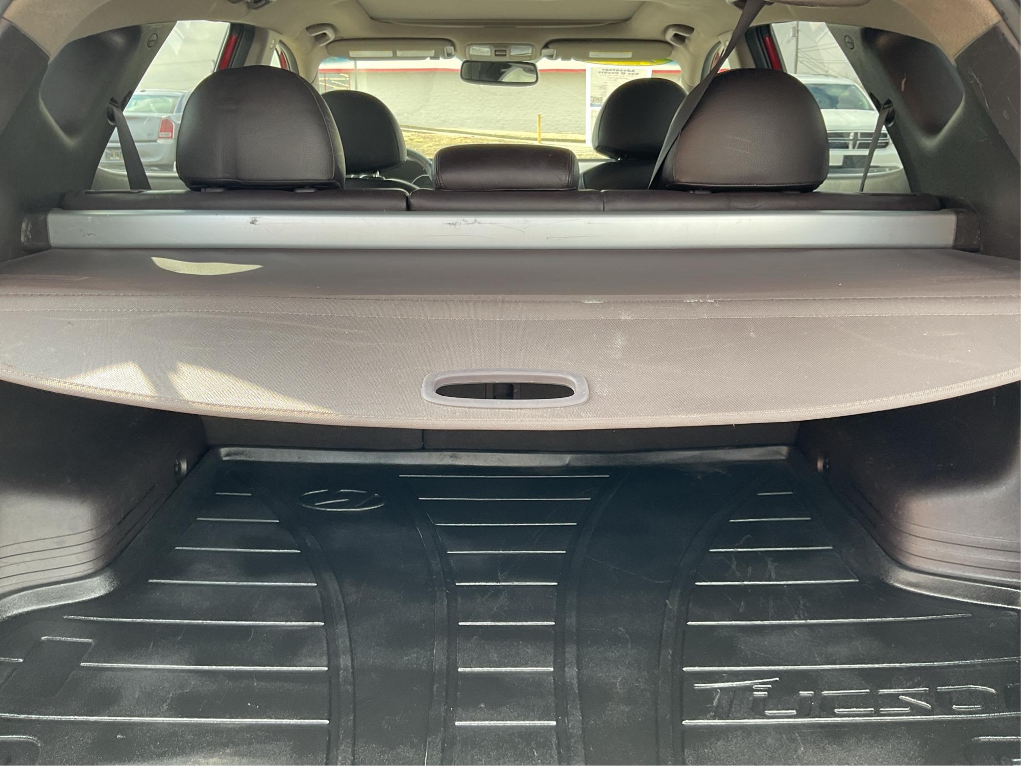 2013 Hyundai Tucson Limited (KM8JU3AC4DU) with an Theta II 2.4L I-4 DOHC engine, located at 1184 Kauffman Ave, Fairborn, OH, 45324, (937) 908-9800, 39.807072, -84.030914 - Photo#10