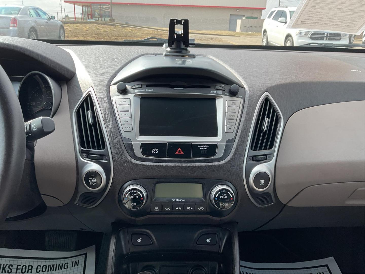 2013 Hyundai Tucson Limited (KM8JU3AC4DU) with an Theta II 2.4L I-4 DOHC engine, located at 1099 N County Rd 25A, Troy, OH, 45373, (937) 908-9800, 40.057079, -84.212883 - Photo#11
