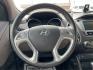 2013 Hyundai Tucson Limited (KM8JU3AC4DU) with an Theta II 2.4L I-4 DOHC engine, located at 1099 N County Rd 25A, Troy, OH, 45373, (937) 908-9800, 40.057079, -84.212883 - Photo#14