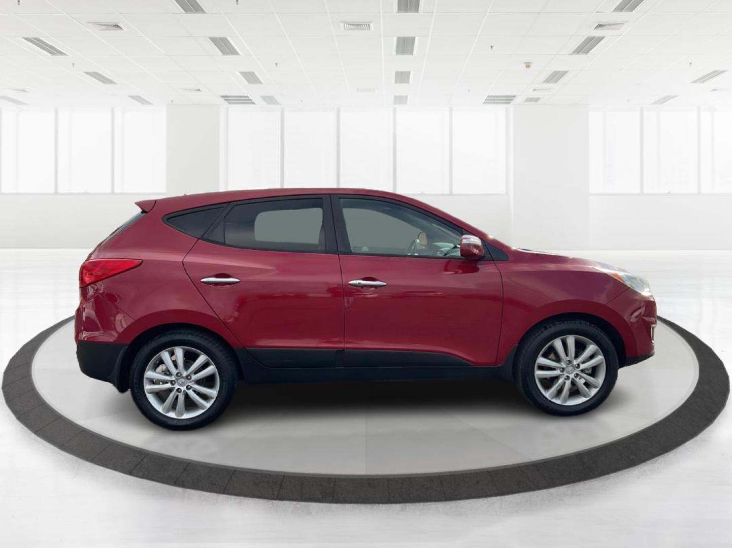 2013 Hyundai Tucson Limited (KM8JU3AC4DU) with an Theta II 2.4L I-4 DOHC engine, located at 1099 N County Rd 25A, Troy, OH, 45373, (937) 908-9800, 40.057079, -84.212883 - Photo#1