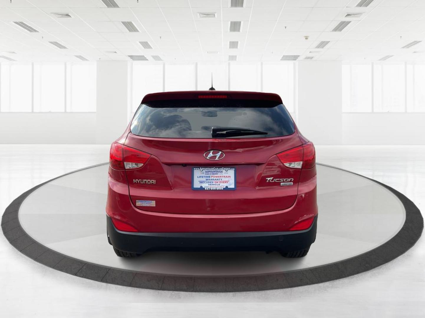 2013 Hyundai Tucson Limited (KM8JU3AC4DU) with an Theta II 2.4L I-4 DOHC engine, located at 1099 N County Rd 25A, Troy, OH, 45373, (937) 908-9800, 40.057079, -84.212883 - Photo#2