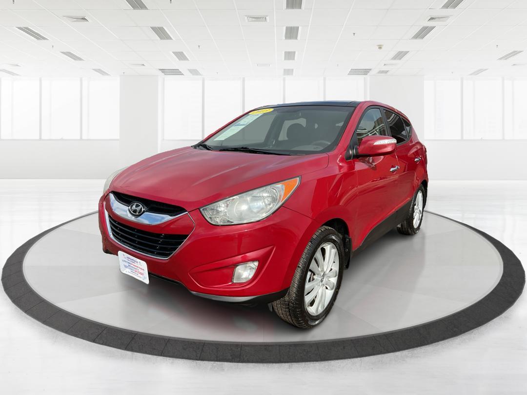 2013 Hyundai Tucson Limited (KM8JU3AC4DU) with an Theta II 2.4L I-4 DOHC engine, located at 1184 Kauffman Ave, Fairborn, OH, 45324, (937) 908-9800, 39.807072, -84.030914 - Photo#6