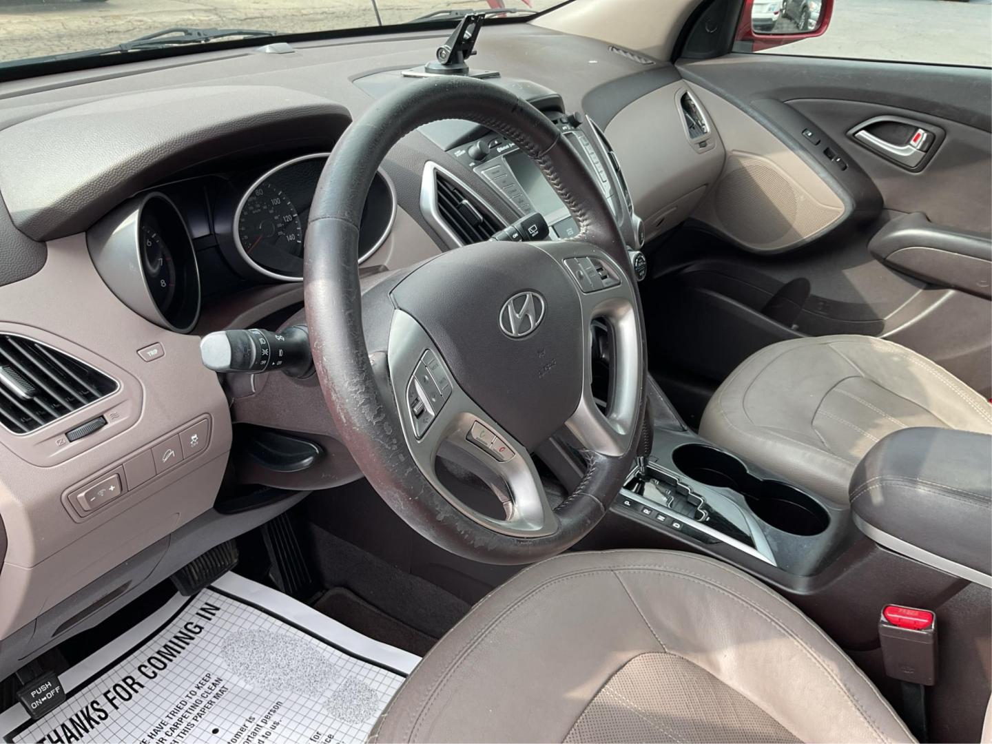 2013 Hyundai Tucson Limited (KM8JU3AC4DU) with an Theta II 2.4L I-4 DOHC engine, located at 1099 N County Rd 25A, Troy, OH, 45373, (937) 908-9800, 40.057079, -84.212883 - Photo#7