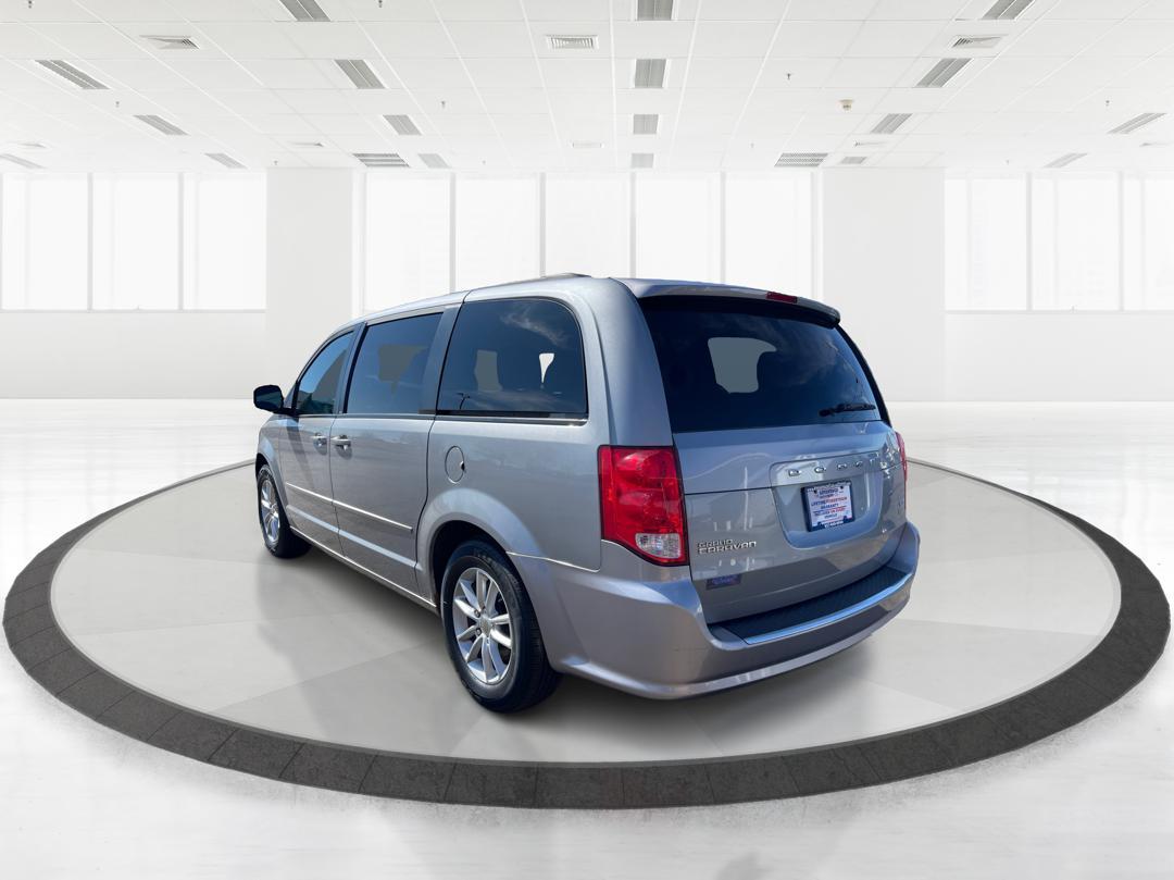 2014 Dodge Grand Caravan SXT (2C4RDGCG4ER) with an 3.6L V-6 DOHC engine, located at 880 E. National Road, Vandalia, OH, 45377, (937) 908-9800, 39.891918, -84.183594 - Photo#4