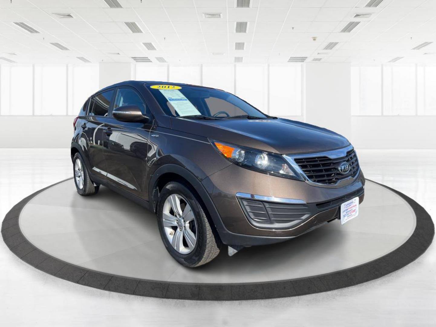 2012 Kia Sportage LX (KNDPBCA20C7) with an 2.4L I-4 DOHC engine, located at 401 Woodman Dr, Riverside, OH, 45431, (937) 908-9800, 39.760899, -84.123421 - Photo#0