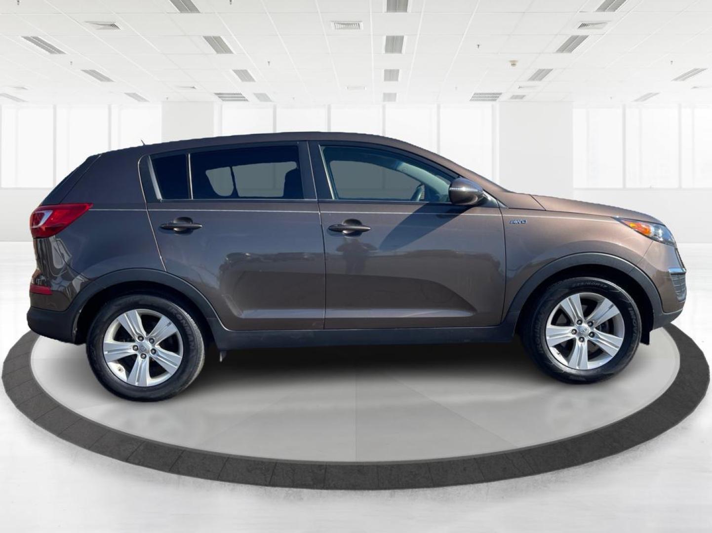 2012 Kia Sportage LX (KNDPBCA20C7) with an 2.4L I-4 DOHC engine, located at 401 Woodman Dr, Riverside, OH, 45431, (937) 908-9800, 39.760899, -84.123421 - Photo#1