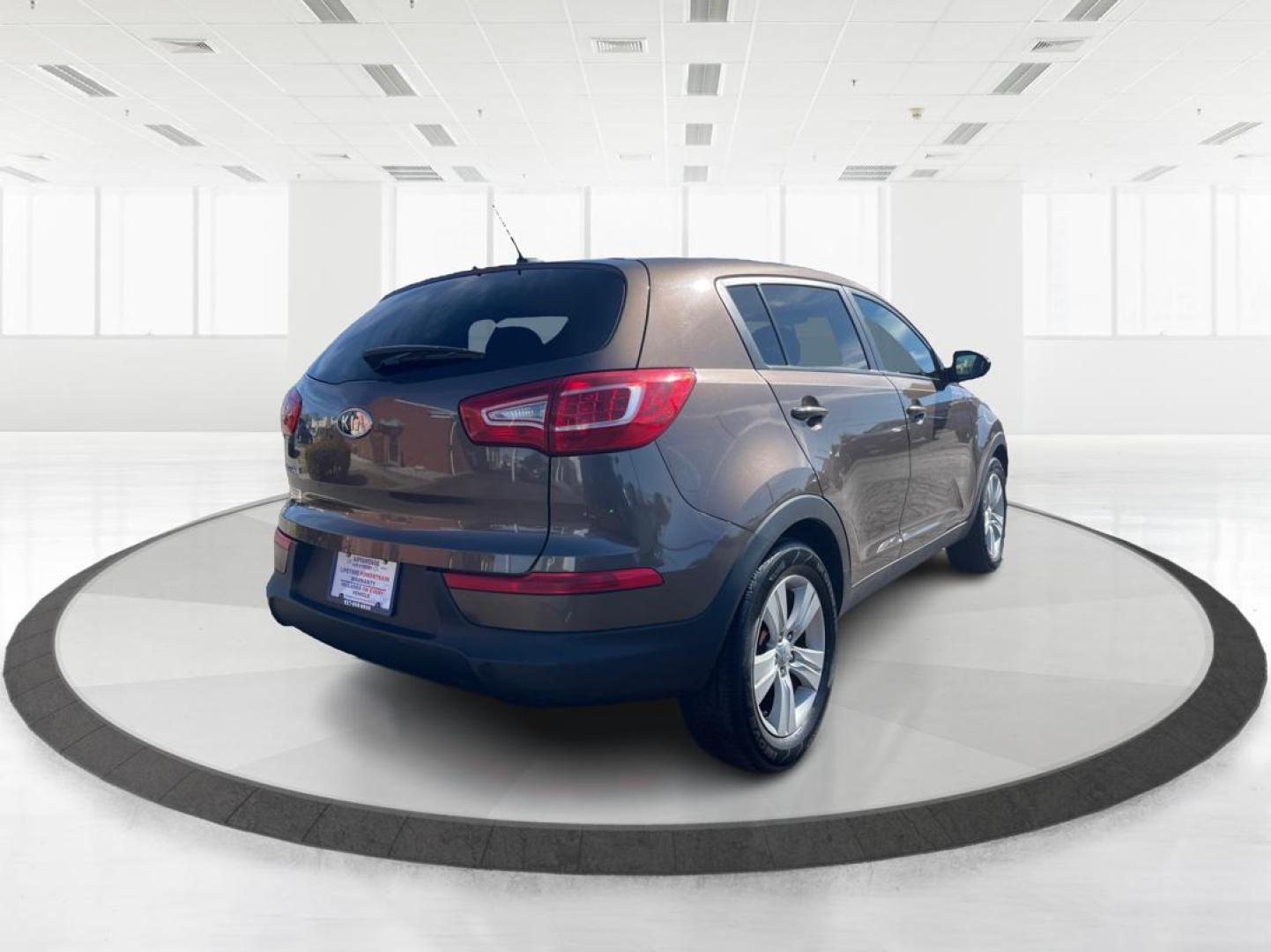 2012 Kia Sportage LX (KNDPBCA20C7) with an 2.4L I-4 DOHC engine, located at 401 Woodman Dr, Riverside, OH, 45431, (937) 908-9800, 39.760899, -84.123421 - Photo#2
