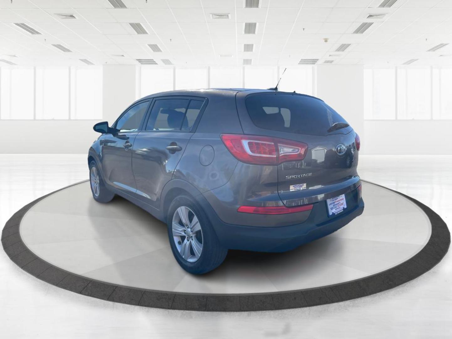 2012 Kia Sportage LX (KNDPBCA20C7) with an 2.4L I-4 DOHC engine, located at 401 Woodman Dr, Riverside, OH, 45431, (937) 908-9800, 39.760899, -84.123421 - Photo#4