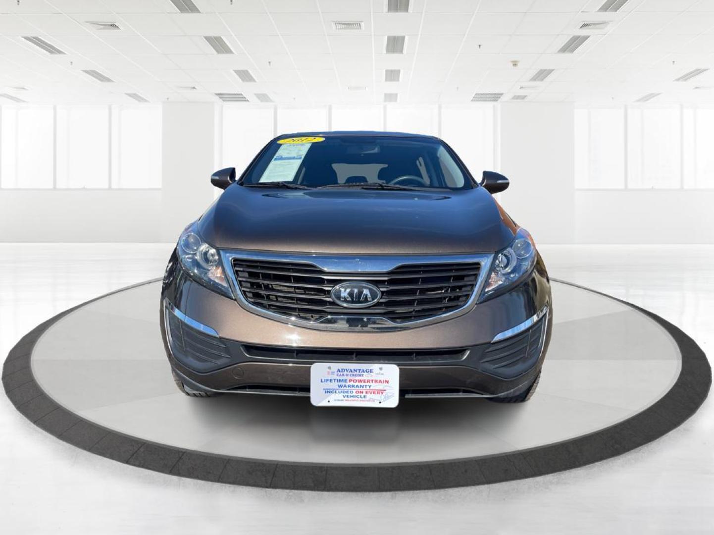 2012 Kia Sportage LX (KNDPBCA20C7) with an 2.4L I-4 DOHC engine, located at 401 Woodman Dr, Riverside, OH, 45431, (937) 908-9800, 39.760899, -84.123421 - Photo#6