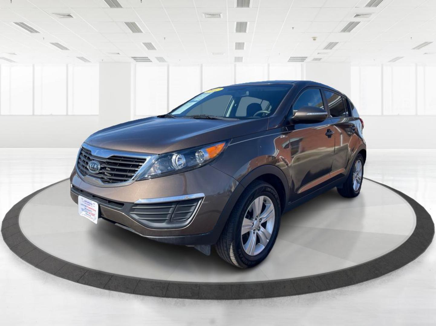2012 Kia Sportage LX (KNDPBCA20C7) with an 2.4L I-4 DOHC engine, located at 401 Woodman Dr, Riverside, OH, 45431, (937) 908-9800, 39.760899, -84.123421 - Photo#7