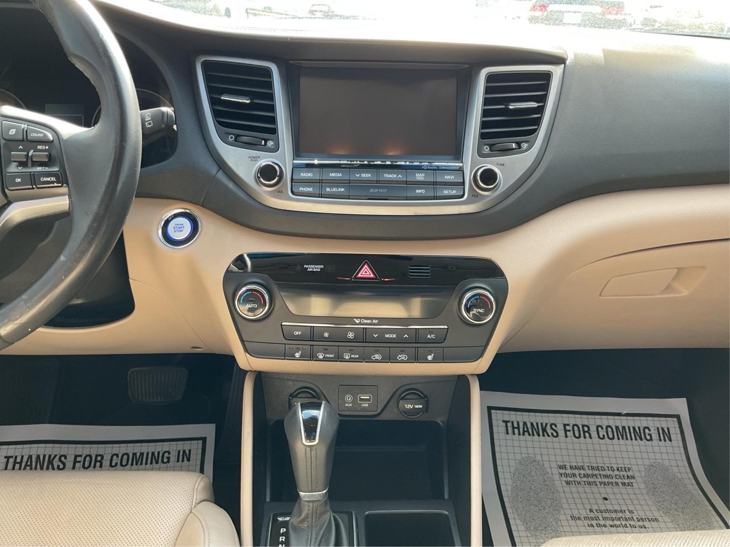 2016 Hyundai Tucson Limited (KM8J3CA20GU) with an 1.6L I-4 gasoline direct injection engine, located at 1099 N County Rd 25A, Troy, OH, 45373, (937) 908-9800, 40.057079, -84.212883 - Photo#12