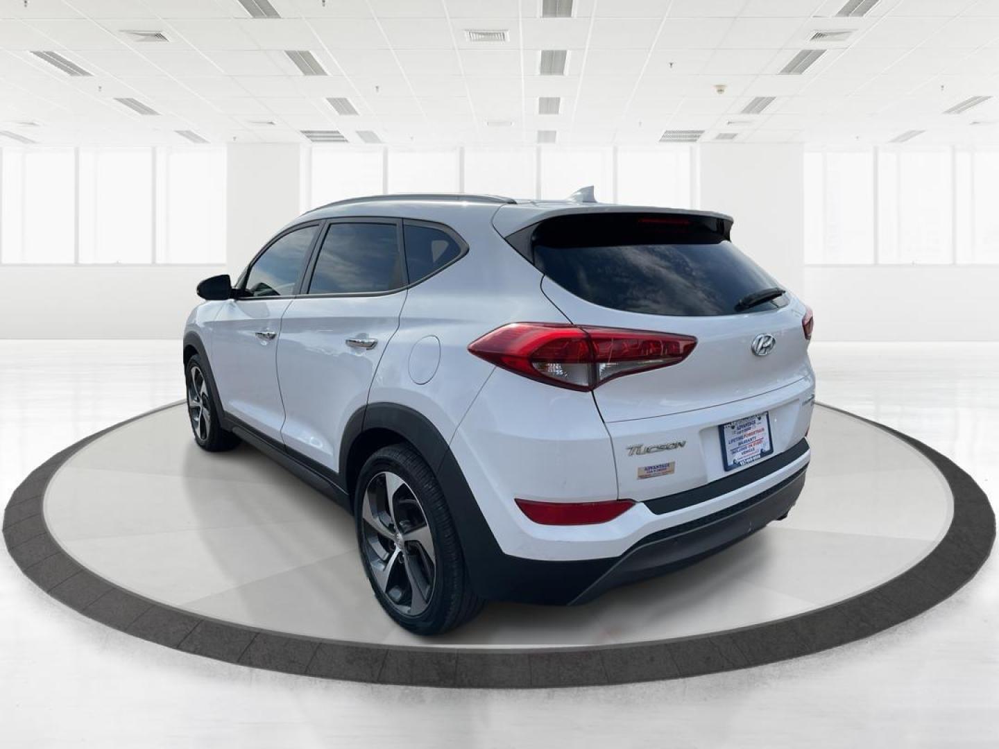 2016 Hyundai Tucson Limited (KM8J3CA20GU) with an 1.6L I-4 gasoline direct injection engine, located at 1099 N County Rd 25A, Troy, OH, 45373, (937) 908-9800, 40.057079, -84.212883 - Photo#4