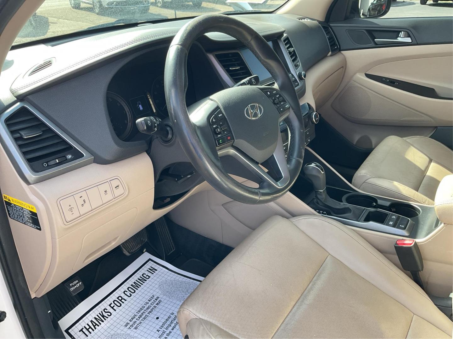 2016 Hyundai Tucson Limited (KM8J3CA20GU) with an 1.6L I-4 gasoline direct injection engine, located at 1099 N County Rd 25A, Troy, OH, 45373, (937) 908-9800, 40.057079, -84.212883 - Photo#8