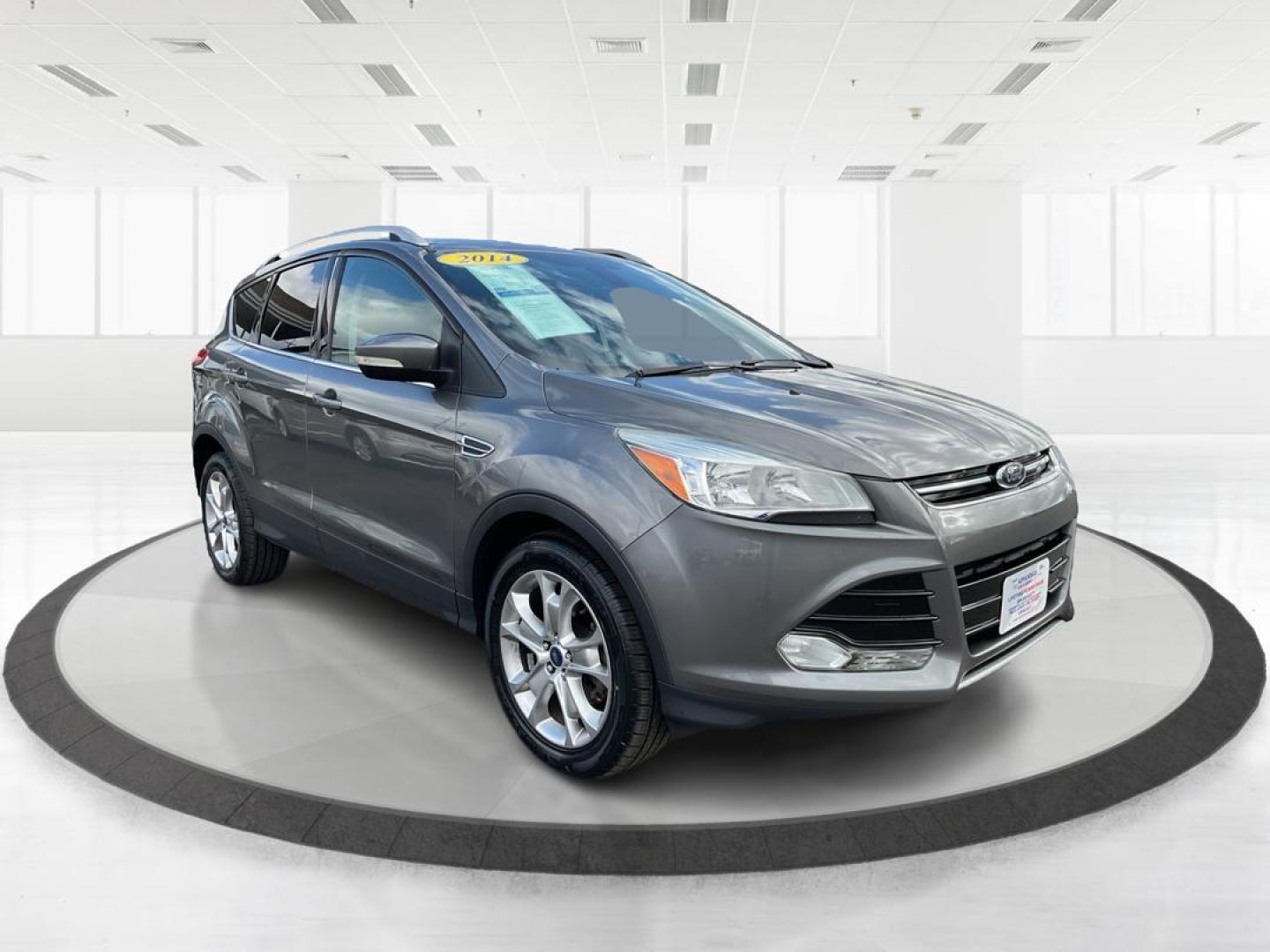 2014 Ford Escape Titanium (1FMCU9J95EU) with an EcoBoost 1.6L I-4 gasoline direct injection engine, located at 8750 N County Rd 25A, Piqua, OH, 45356, (937) 908-9800, 40.164391, -84.232513 - Photo#0
