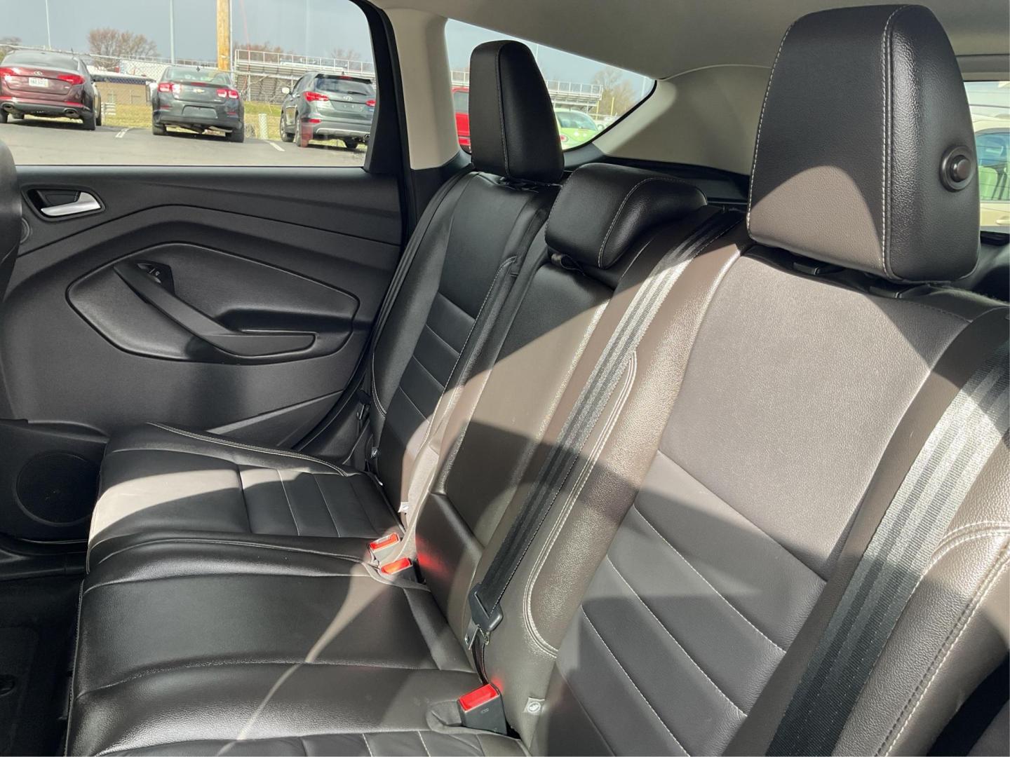2014 Ford Escape Titanium (1FMCU9J95EU) with an EcoBoost 1.6L I-4 gasoline direct injection engine, located at 8750 N County Rd 25A, Piqua, OH, 45356, (937) 908-9800, 40.164391, -84.232513 - Photo#9