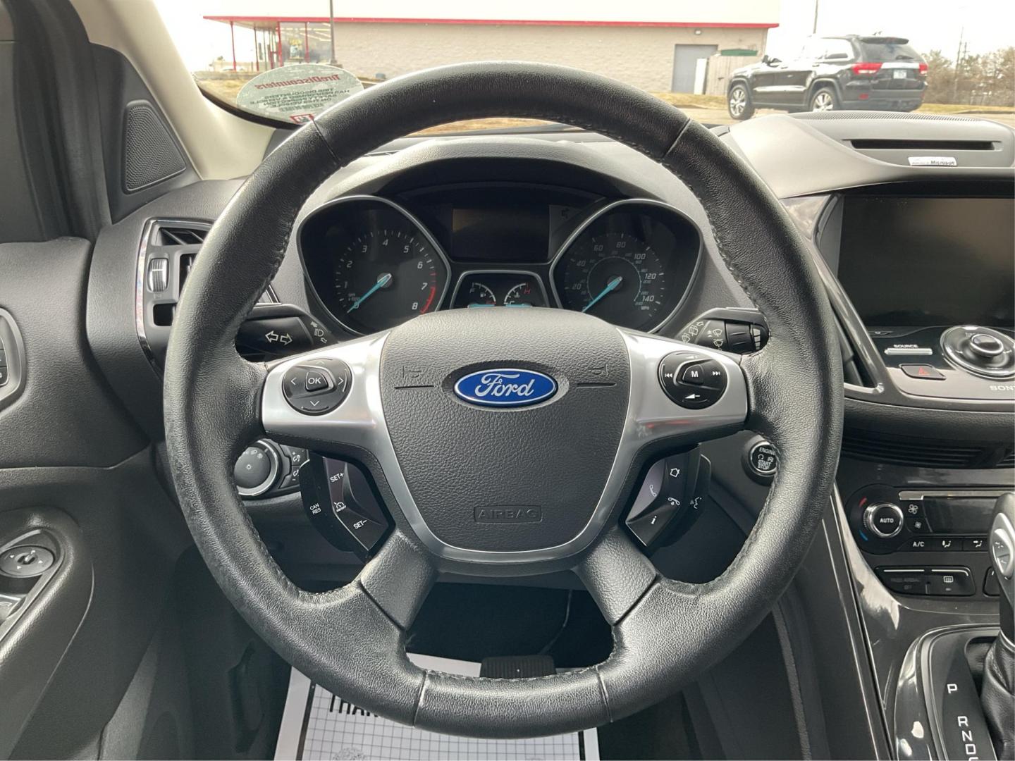 2014 Ford Escape Titanium (1FMCU9J95EU) with an EcoBoost 1.6L I-4 gasoline direct injection engine, located at 8750 N County Rd 25A, Piqua, OH, 45356, (937) 908-9800, 40.164391, -84.232513 - Photo#15