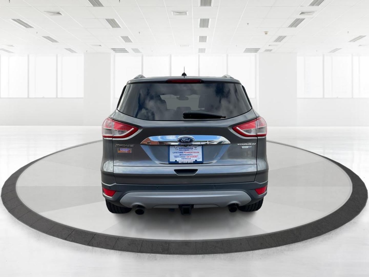 2014 Ford Escape Titanium (1FMCU9J95EU) with an EcoBoost 1.6L I-4 gasoline direct injection engine, located at 8750 N County Rd 25A, Piqua, OH, 45356, (937) 908-9800, 40.164391, -84.232513 - Photo#3