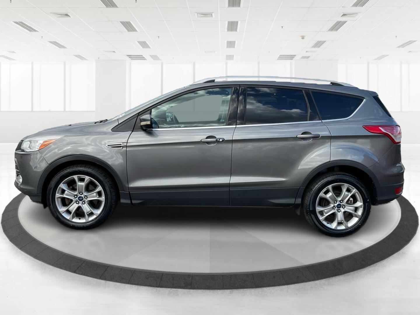 2014 Ford Escape Titanium (1FMCU9J95EU) with an EcoBoost 1.6L I-4 gasoline direct injection engine, located at 8750 N County Rd 25A, Piqua, OH, 45356, (937) 908-9800, 40.164391, -84.232513 - Photo#5