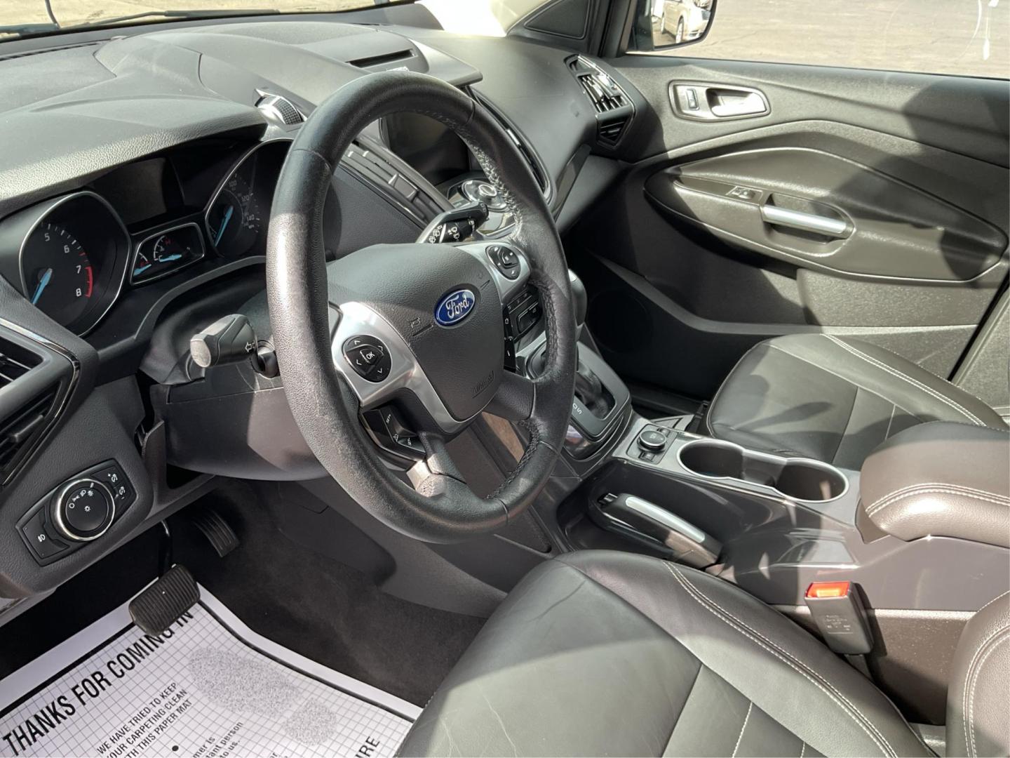 2014 Ford Escape Titanium (1FMCU9J95EU) with an EcoBoost 1.6L I-4 gasoline direct injection engine, located at 8750 N County Rd 25A, Piqua, OH, 45356, (937) 908-9800, 40.164391, -84.232513 - Photo#8