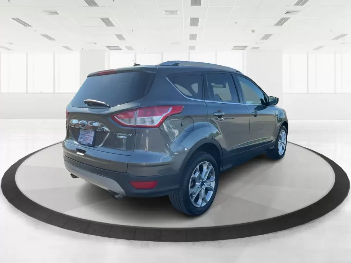 2016 Ford Escape Titanium (1FMCU9J92GU) with an EcoBoost 1.6L I-4 gasoline direct injection engine, located at 1184 Kauffman Ave, Fairborn, OH, 45324, (937) 908-9800, 39.807072, -84.030914 - Photo#1