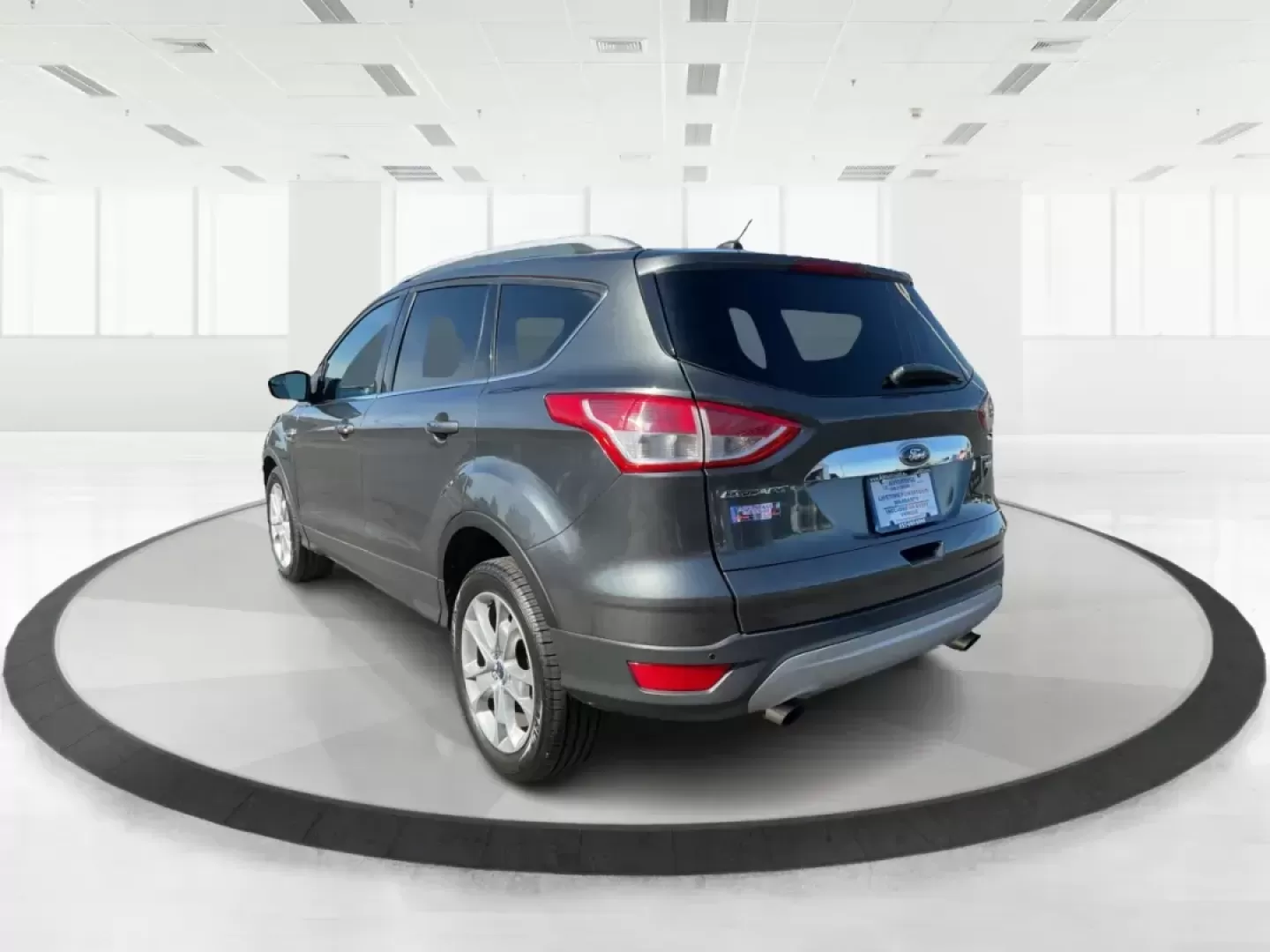 2016 Ford Escape Titanium (1FMCU9J92GU) with an EcoBoost 1.6L I-4 gasoline direct injection engine, located at 1184 Kauffman Ave, Fairborn, OH, 45324, (937) 908-9800, 39.807072, -84.030914 - Photo#4