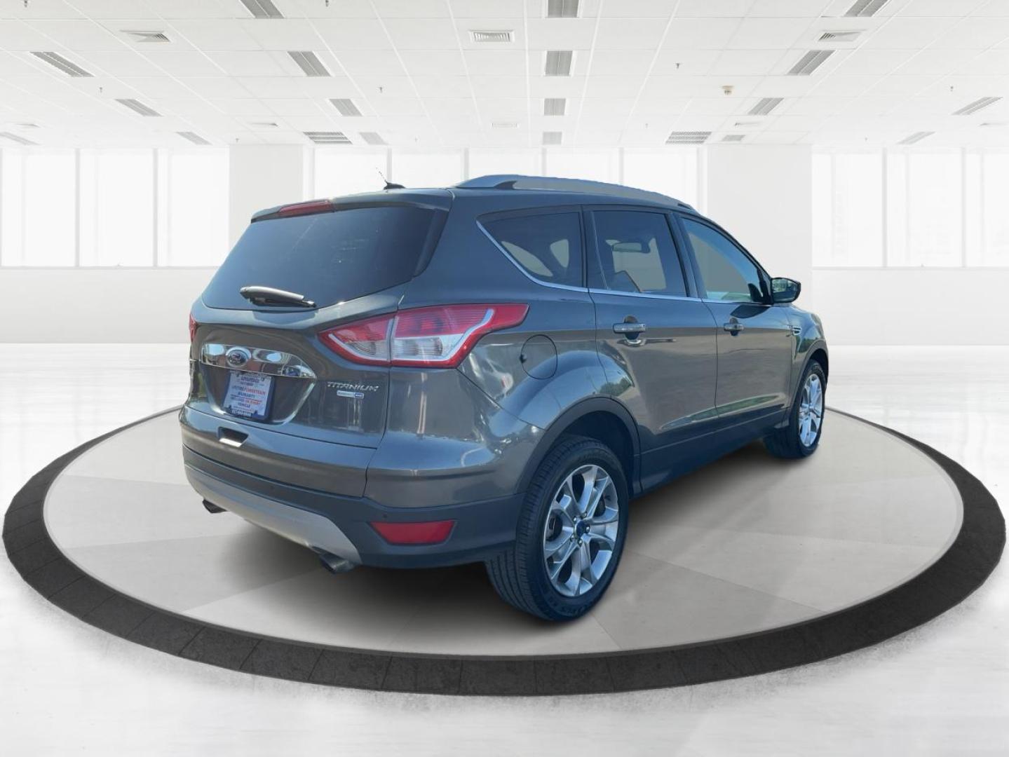 2016 Ford Escape Titanium (1FMCU9J92GU) with an EcoBoost 1.6L I-4 gasoline direct injection engine, located at 1184 Kauffman Ave, Fairborn, OH, 45324, (937) 908-9800, 39.807072, -84.030914 - Photo#2