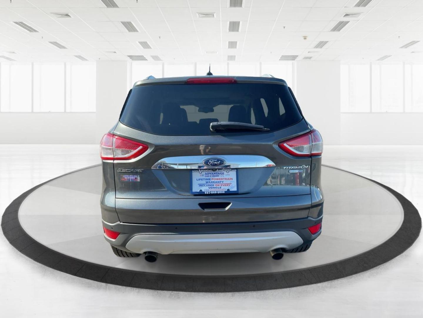 2016 Ford Escape Titanium (1FMCU9J92GU) with an EcoBoost 1.6L I-4 gasoline direct injection engine, located at 1184 Kauffman Ave, Fairborn, OH, 45324, (937) 908-9800, 39.807072, -84.030914 - Photo#3
